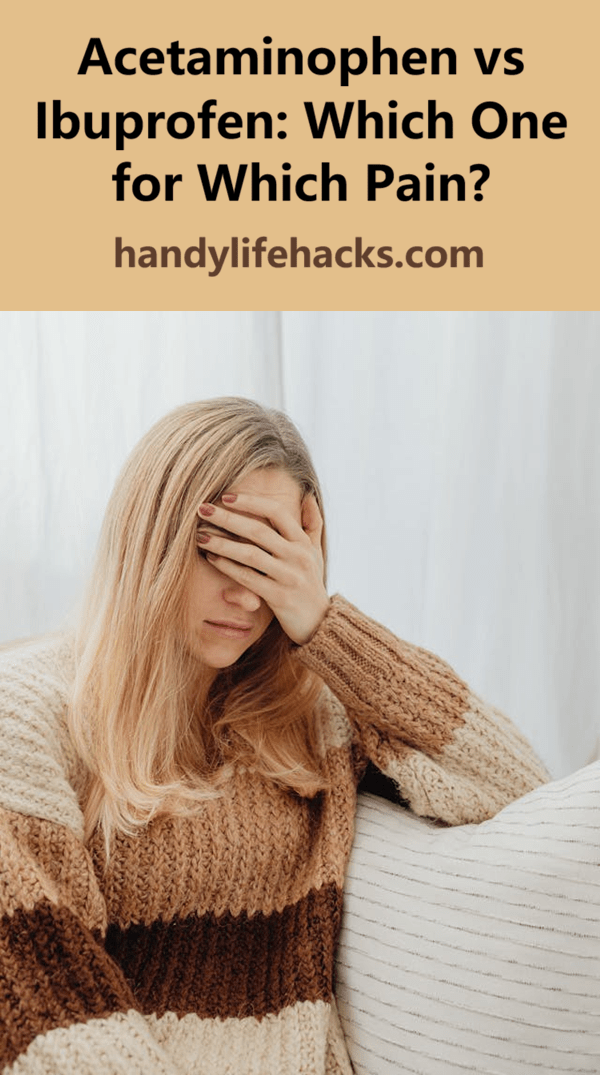 woman with a headache with her hand covering her eyes and forehead