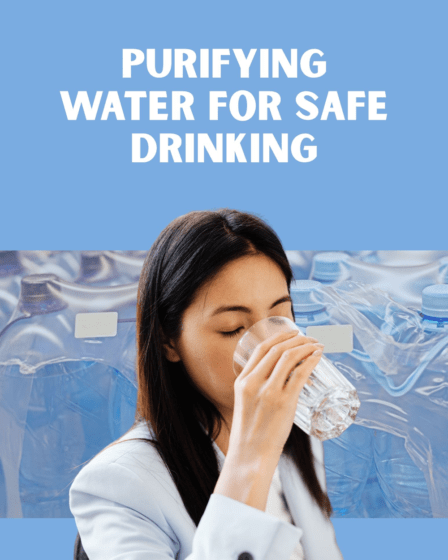 woman drinking a glass of water